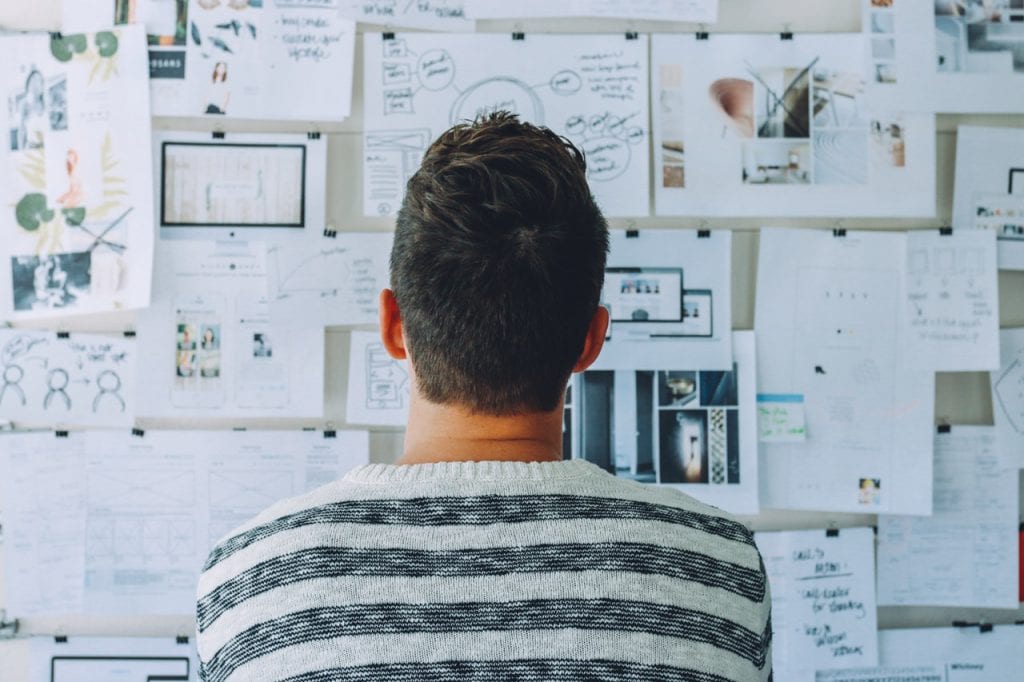 Man trying to figure out the best RFP layout.