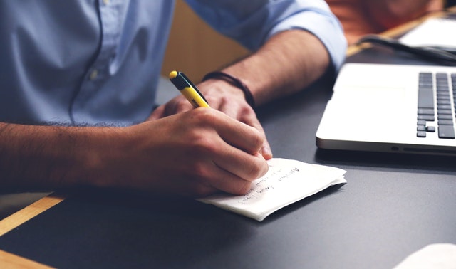 man with checklist for his RFP layout