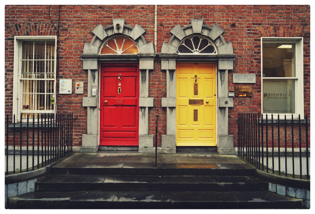 a red door and yellow door representing which option to choose
