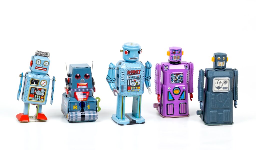 a picture of five robots that represent the automation process 