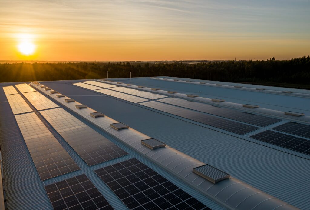 Solar panels on a roof at sunset